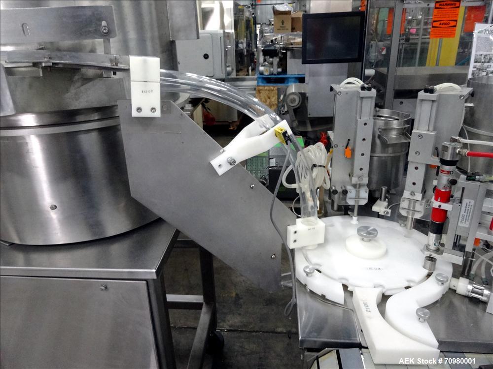 Used M&O Perry P-3000 II Monoblock Unscrambler, Filler, Plugger, and Screw Capper. Capable of speeds up to 35 bottles per minute. Has Watson Marlow Model 505Di Single head, peristaltic pump filler, H...