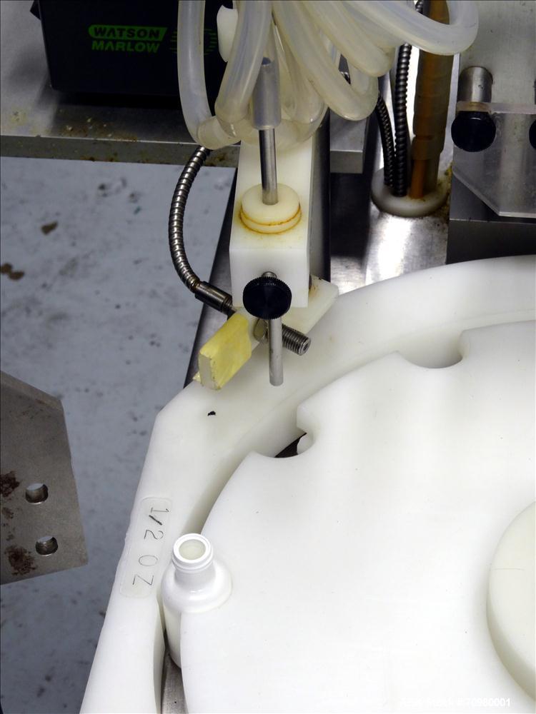 Used M&O Perry P-3000 II Monoblock Unscrambler, Filler, Plugger, and Screw Capper. Capable of speeds up to 35 bottles per minute. Has Watson Marlow Model 505Di Single head, peristaltic pump filler, H...