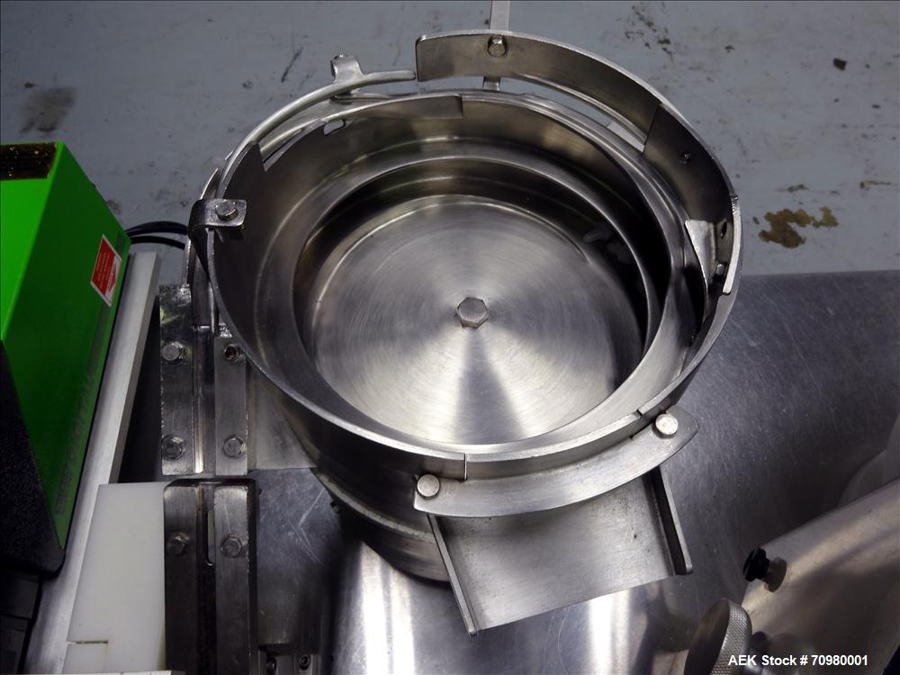 Used M&O Perry P-3000 II Monoblock Unscrambler, Filler, Plugger, and Screw Capper. Capable of speeds up to 35 bottles per minute. Has Watson Marlow Model 505Di Single head, peristaltic pump filler, H...