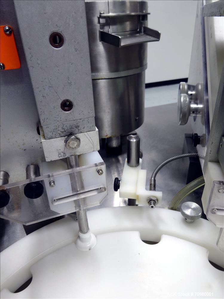 Used M&O Perry P-3000 II Monoblock Unscrambler, Filler, Plugger, and Screw Capper. Capable of speeds up to 35 bottles per minute. Has Watson Marlow Model 505Di Single head, peristaltic pump filler, H...