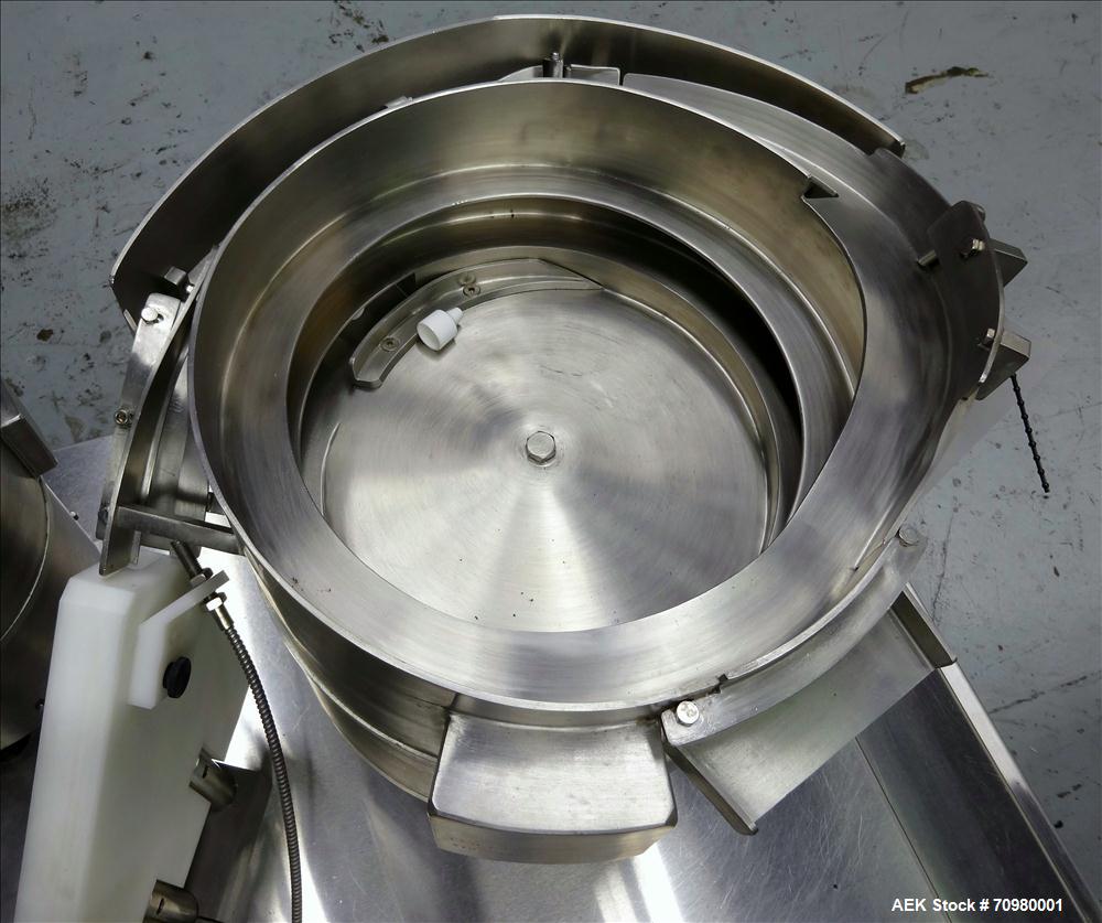 Used M&O Perry P-3000 II Monoblock Unscrambler, Filler, Plugger, and Screw Capper. Capable of speeds up to 35 bottles per minute. Has Watson Marlow Model 505Di Single head, peristaltic pump filler, H...