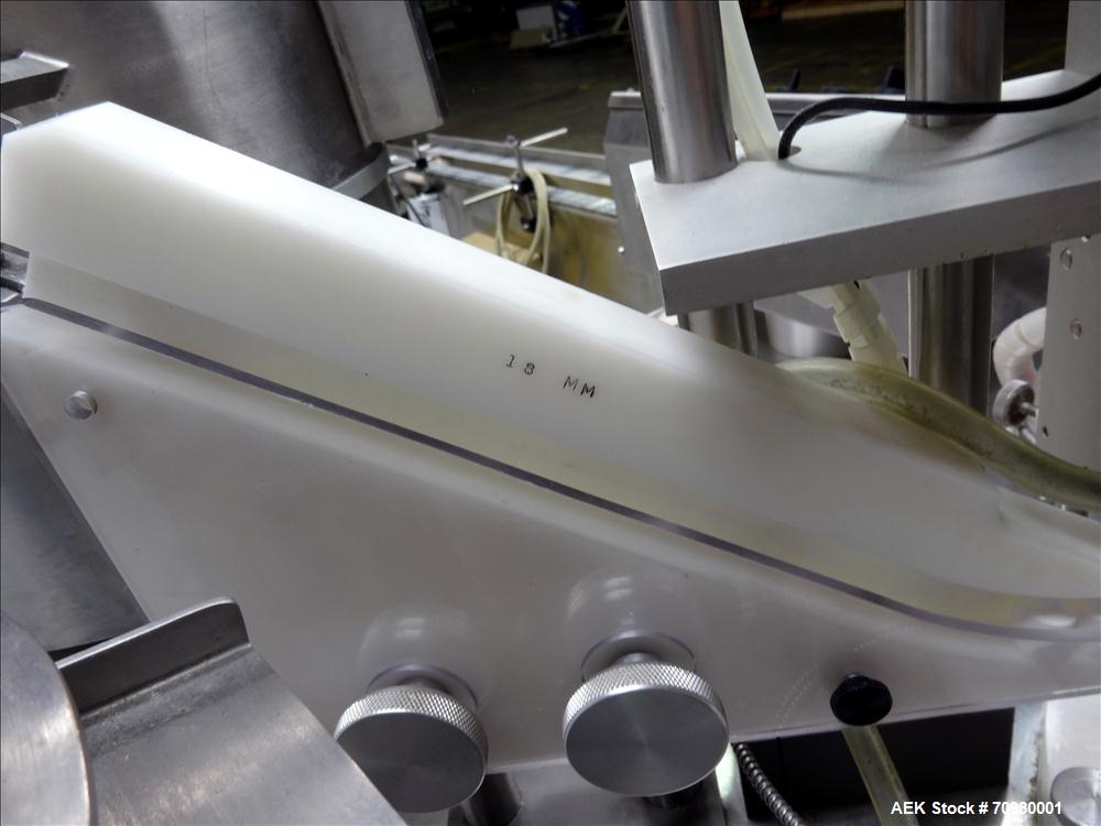 Used M&O Perry P-3000 II Monoblock Unscrambler, Filler, Plugger, and Screw Capper. Capable of speeds up to 35 bottles per minute. Has Watson Marlow Model 505Di Single head, peristaltic pump filler, H...