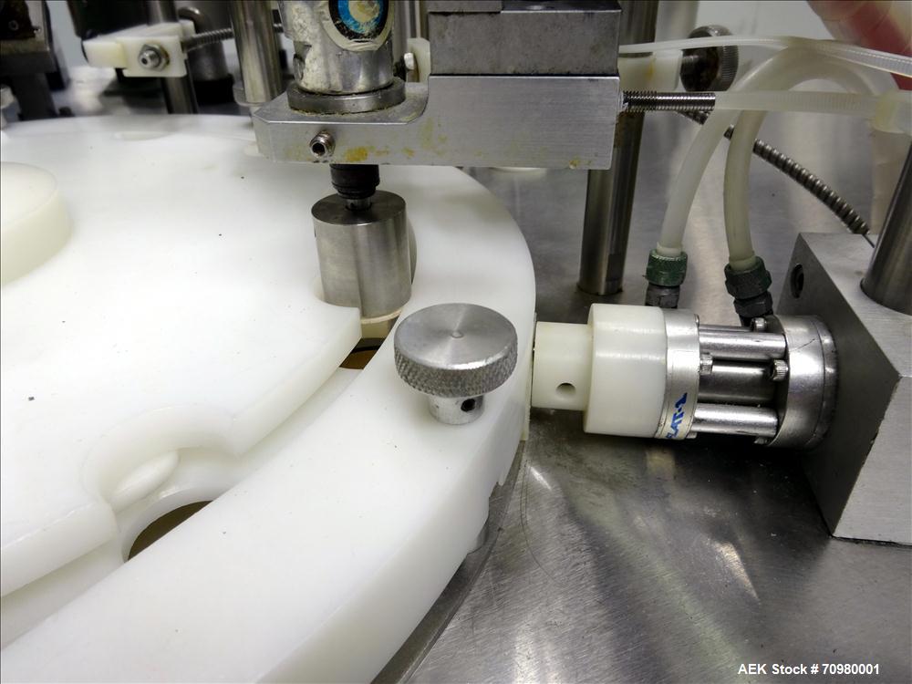 Used M&O Perry P-3000 II Monoblock Unscrambler, Filler, Plugger, and Screw Capper. Capable of speeds up to 35 bottles per minute. Has Watson Marlow Model 505Di Single head, peristaltic pump filler, H...