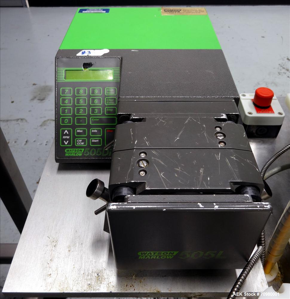 Used M&O Perry P-3000 II Monoblock Unscrambler, Filler, Plugger, and Screw Capper. Capable of speeds up to 35 bottles per minute. Has Watson Marlow Model 505Di Single head, peristaltic pump filler, H...