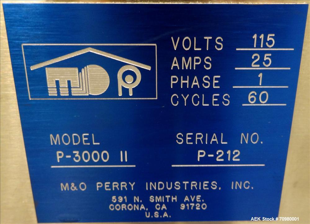 Used M&O Perry P-3000 II Monoblock Unscrambler, Filler, Plugger, and Screw Capper. Capable of speeds up to 35 bottles per minute. Has Watson Marlow Model 505Di Single head, peristaltic pump filler, H...
