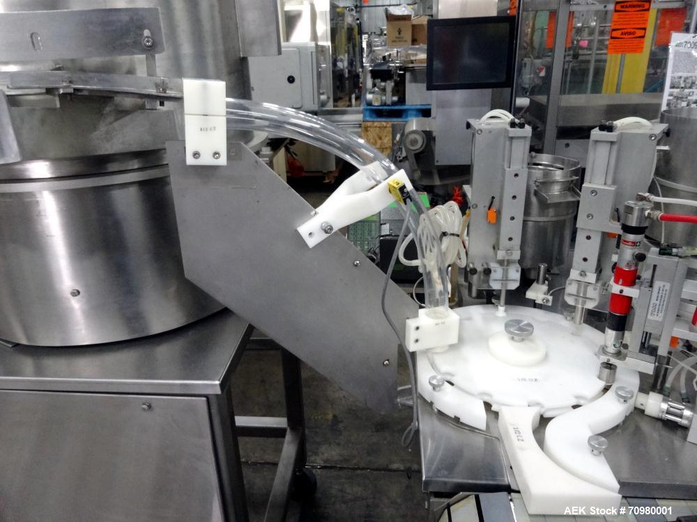 Used M&O Perry P-3000 II Monoblock Unscrambler, Filler, Plugger, and Screw Capper. Capable of speeds up to 35 bottles per minute. Has Watson Marlow Model 505Di Single head, peristaltic pump filler, H...