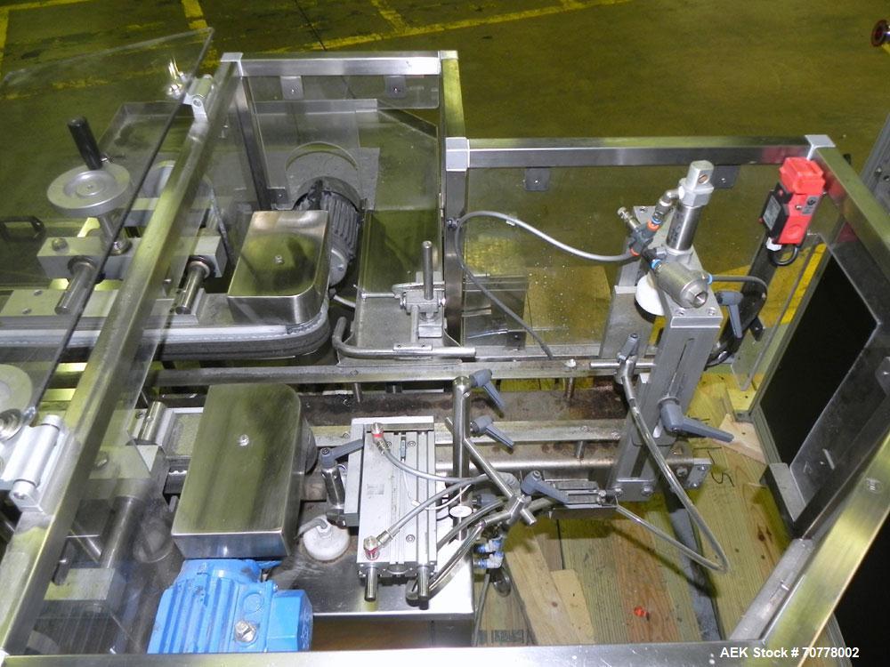 Used OMAS Filling Line with  Pump Inserting, Crimping and Labeling line