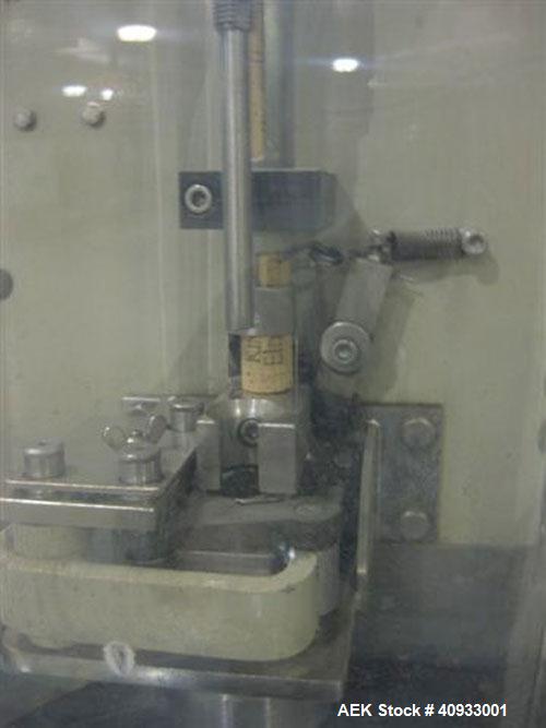 Used Seitz (KHS Filling) Monoblock 12 Head Rotary Wine Filler and Corker. Capable of speeds up to 60 BPM. Has 5/8" diameter nozzles on 6-3/8" centers. Complete with platform base, vacuum pump, star t...