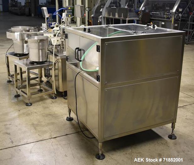 Used Biaozan Monoblock Filling, Tipping, Capping and Labeling.