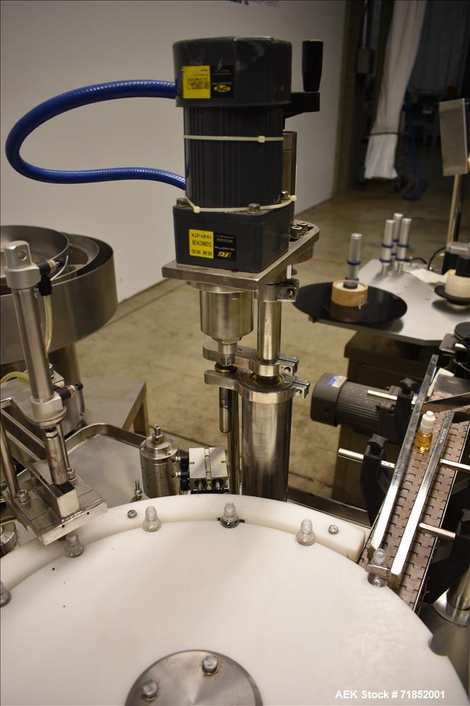 Used Biaozan Monoblock Filling, Tipping, Capping and Labeling.