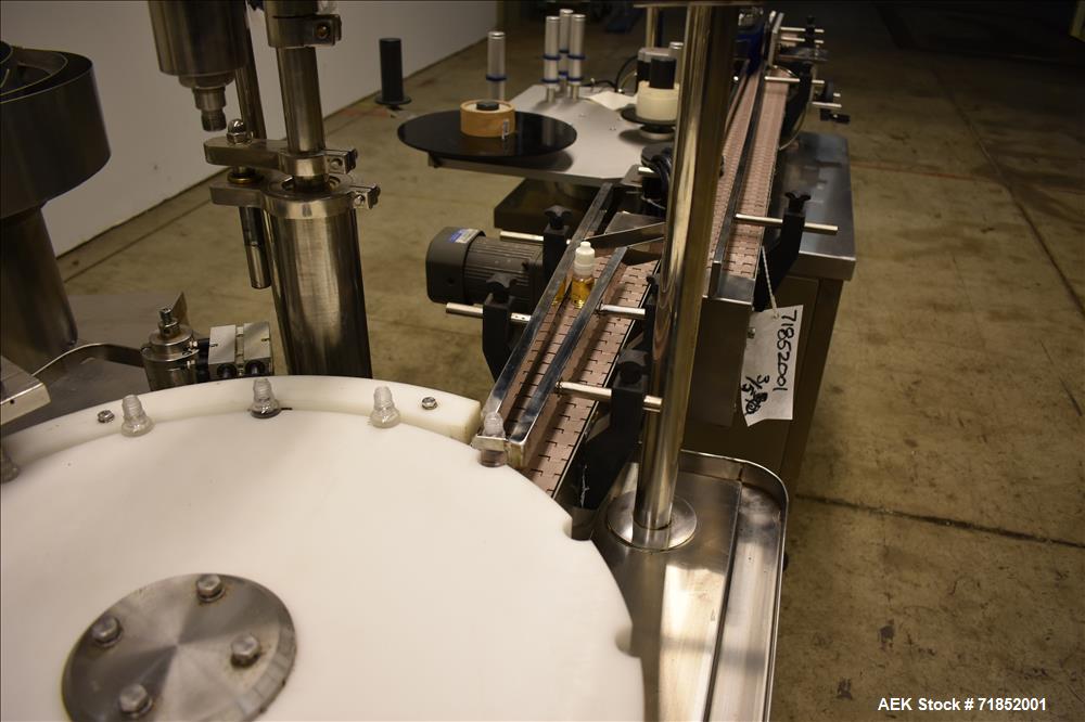 Used Biaozan Monoblock Filling, Tipping, Capping and Labeling.