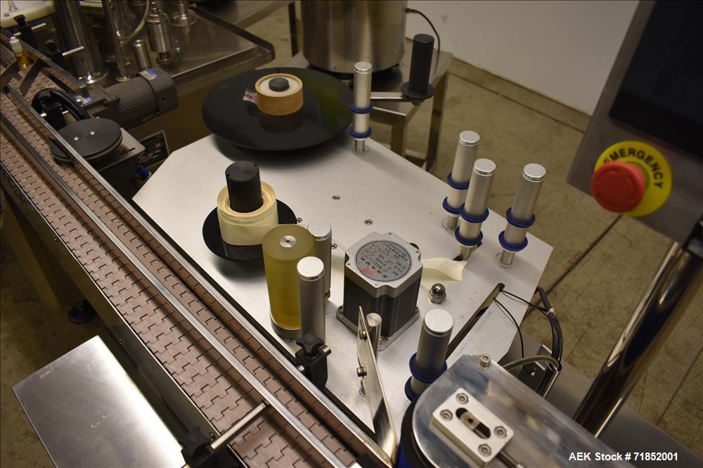 Used Biaozan Monoblock Filling, Tipping, Capping and Labeling.