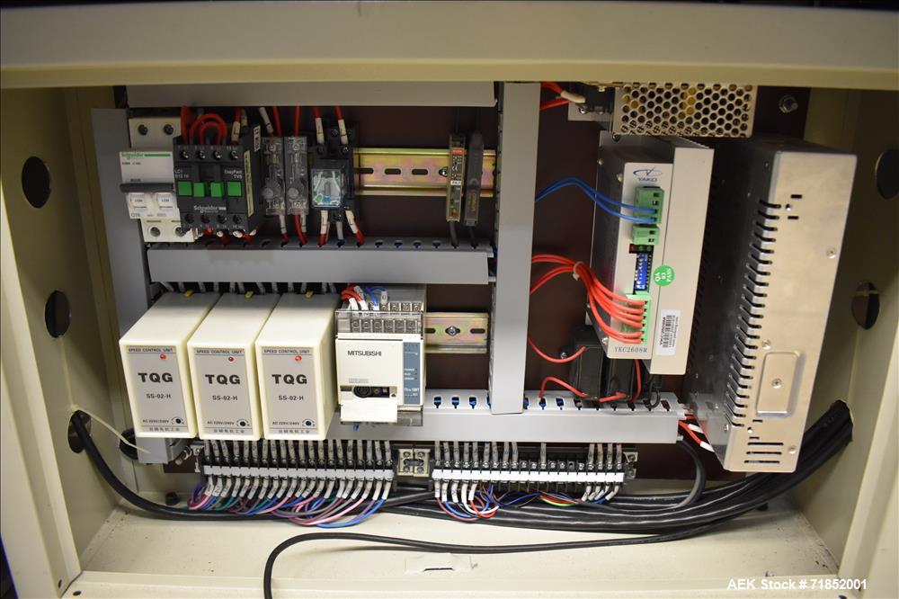 Used Biaozan Monoblock Filling, Tipping, Capping and Labeling.