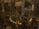 Used Comas model FD120 monoblock filler, stopper and aluminum crimper. Unit dose filler, barrel syringe bowl feeder, dual lanes, two smaller bowls for over cap. Last used for topical, ceramic ivac pu...