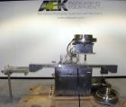 Used Chase-Logeman FS2-12 Monoblock Filler & Stopper Machine. Capable of speeds up to 60 bpm. Fill range: 0-125 ml with change parts. Vial size range: maximum diameter to 2-1/8