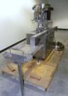 Used Chase-Logeman FS2-12 Monoblock Filler & Stopper Machine. Capable of speeds up to 60 bpm. Fill range: 0-125 ml with change parts. Vial size range: maximum diameter to 2-1/8