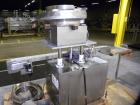 Used Chase-Logeman FS2-12 Monoblock Filler & Stopper Machine. Capable of speeds up to 60 bpm. Fill range: 0-125 ml with change parts. Vial size range: maximum diameter to 2-1/8