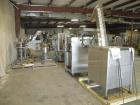 Used Comas Monoblock Line for Fill/Plug/Cap consisting of: (1) Comas Model RS6 Monoblock Filler, Tipper and screw Capper with Integrated Palace Model P2V5 Bulk bottle unscrambler. Has two head perist...