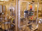 Used Comas Monoblock Line for Fill/Plug/Cap consisting of: (1) Comas Model RS6 Monoblock Filler, Tipper and screw Capper with Integrated Palace Model P2V5 Bulk bottle unscrambler. Has two head perist...