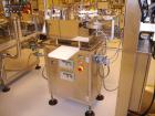 Used Comas Monoblock Line for Fill/Plug/Cap consisting of: (1) Comas Model RS6 Monoblock Filler, Tipper and screw Capper with Integrated Palace Model P2V5 Bulk bottle unscrambler. Has two head perist...