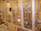 Used Comas Monoblock Line for Fill/Plug/Cap consisting of: (1) Comas Model RS6 Monoblock Filler, Tipper and screw Capper with Integrated Palace Model P2V5 Bulk bottle unscrambler. Has two head perist...