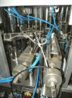 Used Comas Monoblock Line for Fill/Plug/Cap consisting of: (1) Comas Model RS6 Monoblock Filler, Tipper and screw Capper with Integrated Palace Model P2V5 Bulk bottle unscrambler. Has two head perist...