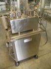 Used Comas Monoblock Line for Fill/Plug/Cap consisting of: (1) Comas Model RS6 Monoblock Filler, Tipper and screw Capper with Integrated Palace Model P2V5 Bulk bottle unscrambler. Has two head perist...