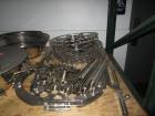 Used Comas Monoblock Line for Fill/Plug/Cap consisting of: (1) Comas Model RS6 Monoblock Filler, Tipper and screw Capper with Integrated Palace Model P2V5 Bulk bottle unscrambler. Has two head perist...