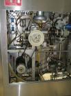 Used Elo Pak PS 30 Milk Carton Filler, gable top, maximum capacity 3000 cartons/hour, filling volume 250, 500 and 1000 ml, laminar flow, air pressure 72 psi, 3/50 hz/400V.