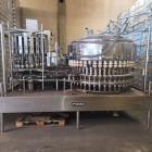 Used-Fogg Model 46-20 Automatic Rotary Monoblock Filler and Capper