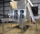 Used Fogg Model FA4214 High Speed Monoblock Liquid Filler and Capper.