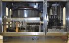 Used Fogg Model FA4214 High Speed Monoblock Liquid Filler and Capper.