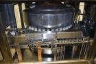 Used Fogg Model FA4214 High Speed Monoblock Liquid Filler and Capper.