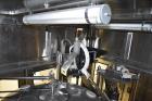 Used Fogg Model FA4214 High Speed Monoblock Liquid Filler and Capper.