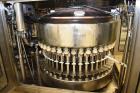 Used Fogg Model FA4214 High Speed Monoblock Liquid Filler and Capper.