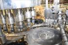 Used Fogg Model FA4214 High Speed Monoblock Liquid Filler and Capper.