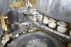 Used Fogg Model FA4214 High Speed Monoblock Liquid Filler and Capper.