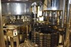 Used- Fogg Model FA4214 High Speed Monoblock Liquid Filler and Capper.