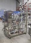Used CFT Carbonated Bottling/Canning Line. Model Master Tronic RS 12/12/3