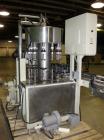 Used Seitz (KHS Filling) Monoblock 12 Head Rotary Wine Filler and Corker. Capable of speeds up to 60 BPM. Has 5/8
