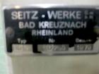 Used Seitz (KHS Filling) Monoblock 12 Head Rotary Wine Filler and Corker. Capable of speeds up to 60 BPM. Has 5/8