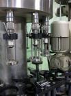 Used Seitz (KHS Filling) Monoblock 12 Head Rotary Wine Filler and Corker. Capable of speeds up to 60 BPM. Has 5/8