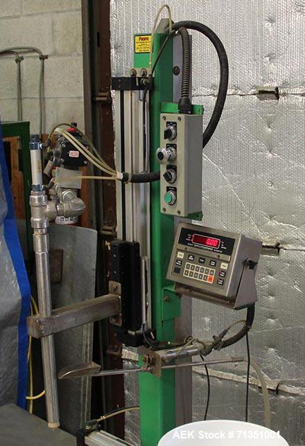 Used Single Head 5 Gallon Pacific Semi-Automatic Net Weight Pail Filler. Pacific, semi-automatic, single head, 5 gallon. Net weight pail filler. Its a bottom up filler with a diving lance to minimize...