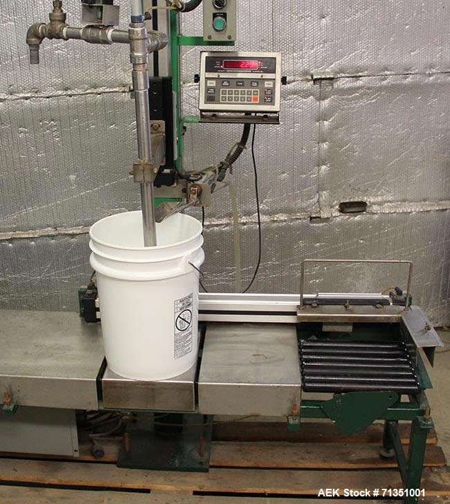 Used Single Head 5 Gallon Pacific Semi-Automatic Net Weight Pail Filler. Pacific, semi-automatic, single head, 5 gallon. Net weight pail filler. Its a bottom up filler with a diving lance to minimize...