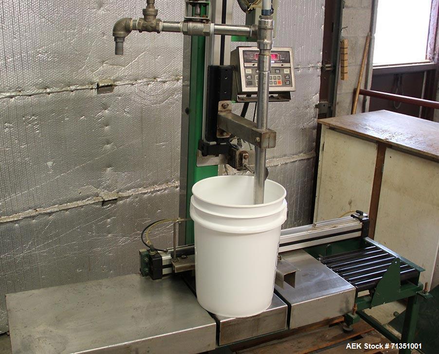 Used Single Head 5 Gallon Pacific Semi-Automatic Net Weight Pail Filler. Pacific, semi-automatic, single head, 5 gallon. Net weight pail filler. Its a bottom up filler with a diving lance to minimize...