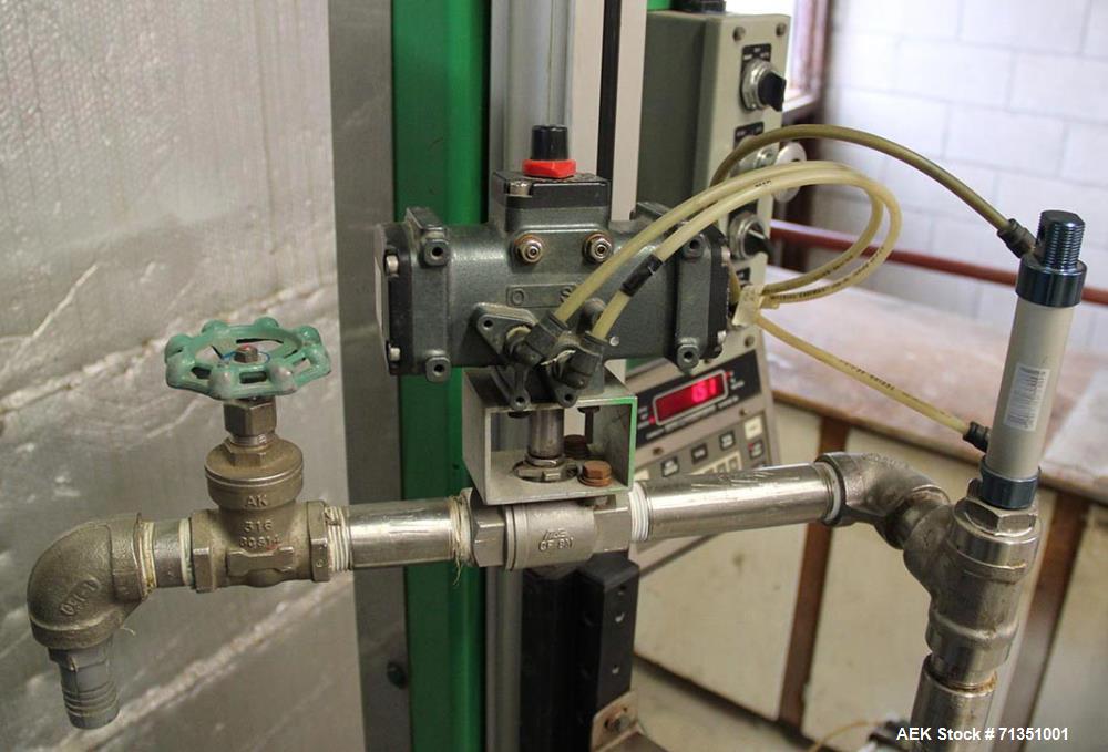 Used Single Head 5 Gallon Pacific Semi-Automatic Net Weight Pail Filler. Pacific, semi-automatic, single head, 5 gallon. Net weight pail filler. Its a bottom up filler with a diving lance to minimize...