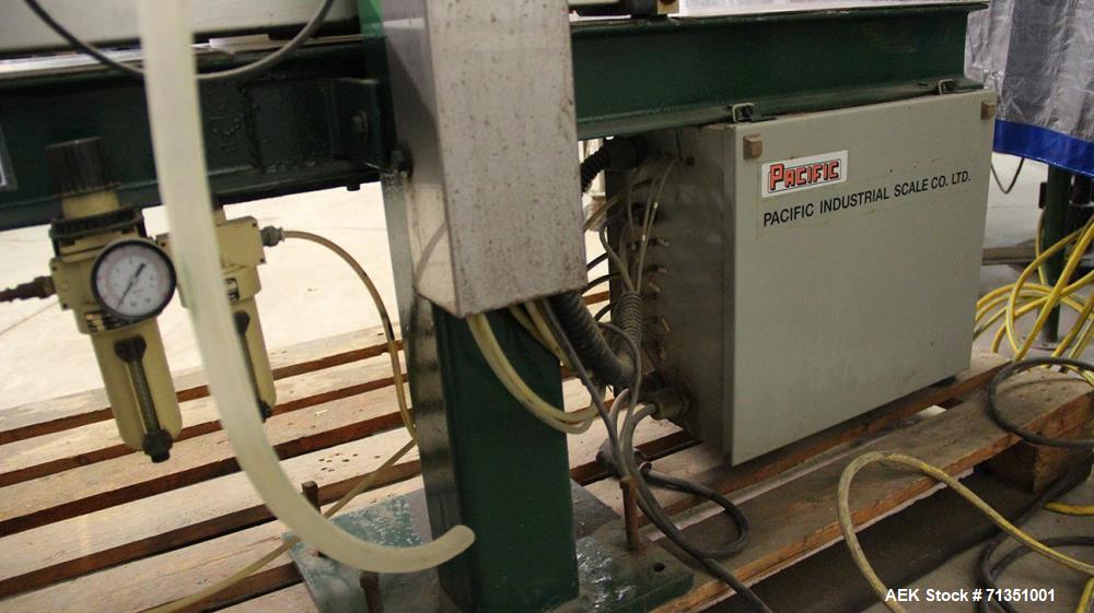 Used Single Head 5 Gallon Pacific Semi-Automatic Net Weight Pail Filler. Pacific, semi-automatic, single head, 5 gallon. Net weight pail filler. Its a bottom up filler with a diving lance to minimize...