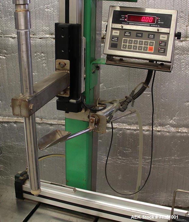 Used Single Head 5 Gallon Pacific Semi-Automatic Net Weight Pail Filler. Pacific, semi-automatic, single head, 5 gallon. Net weight pail filler. Its a bottom up filler with a diving lance to minimize...