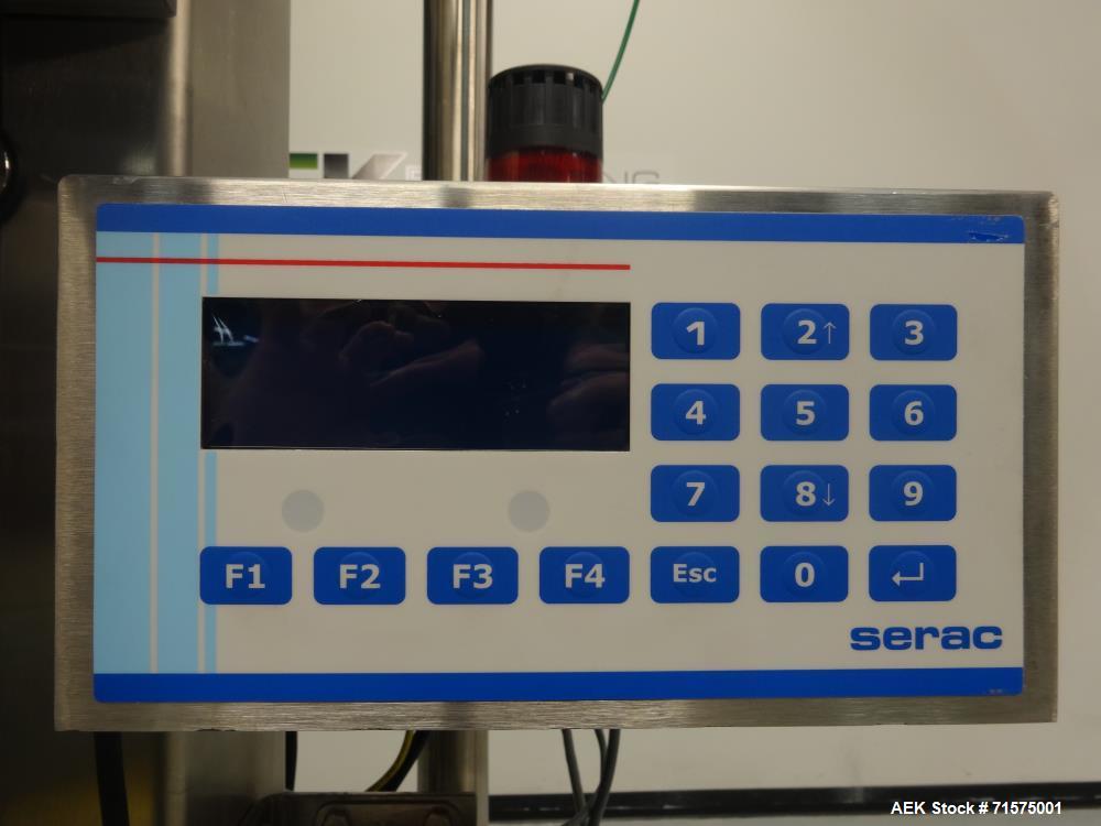Unused- Serac Model 2229 P1 NW DIGI Semi Automatic Filling Machine.