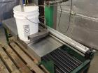 Used Single Head 5 Gallon Pacific Semi-Automatic Net Weight Pail Filler. Pacific, semi-automatic, single head, 5 gallon. Net weight pail filler. Its a bottom up filler with a diving lance to minimize...